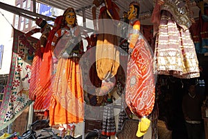 Souvenir Hand made colorful Rajasthan puppets displayed for sale outside a shop. Traditional Indian puppets. : Udaipur Rajasthan