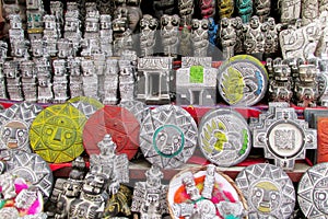 Souvenir idols in bolivian witches market