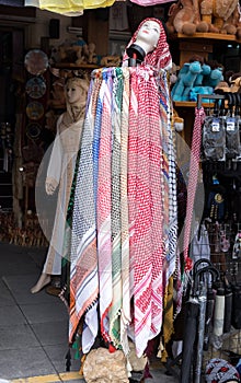 Souvenir kufiya - man's head scarf for sale at gift store