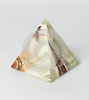 Souvenir, onyx pyramid, on white background