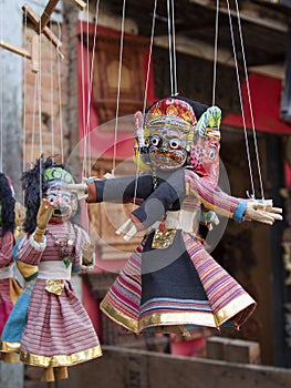 Souvenir puppets hanging in the street shop in Bhaktapur, Nepal