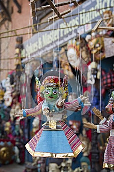 Souvenir puppets hanging in the street shop in Bhaktapur, Nepal