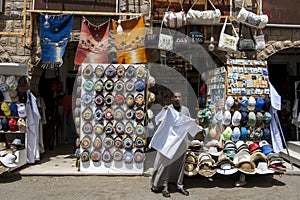 A souvenir seller tries to entice customers into his store at Philae in Aswan, Egypt.