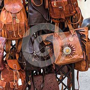 Souvenir shop with leather handbags in Tarragona, Catalunya, Spain. Close-up.