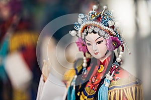 Souvenir store's display window, December 16, 2013 in Beijing, China. Chinese classical character model is tourist souvenirs