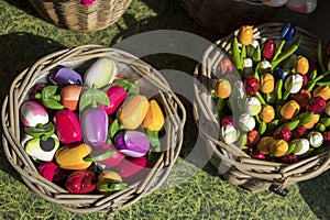 the Souvenirs at Bloemenmarkt - floating flower market on Singel Canal. Amsterdam. Netherlands