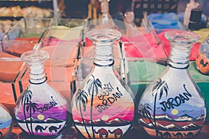 Souvenirs from Jordan - bottles with sand and shapes of desert and camels