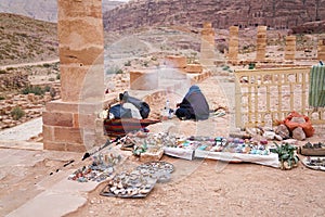 Souvenirs seller in an ancient abandoned rock city of Petra in Jordan