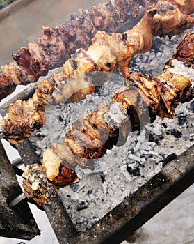 Souvla pork meat cooked on charcoal grill