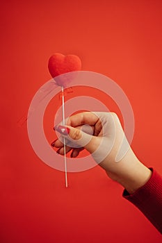 Sovereign velvet hearts on a red backdrop. Copy space. Valentine day concept