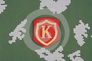 Soviet Army Commandant shoulder patch on camouflage uniform photo