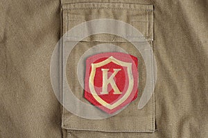 Soviet Army Commandant shoulder patch on khaki uniform photo