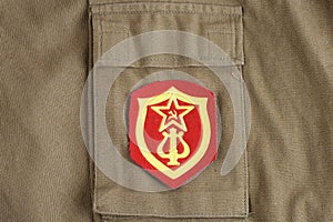 Soviet Army Military Orchestra Service shoulder patch on khaki uniform