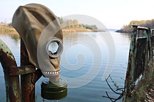 A Soviet era gas mask on a pole at the river in Pripyat, Ukraine, Chernobyl exclusion zone.