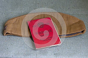 Soviet garrison cap with a red star with a hammer and sickle and a military ID