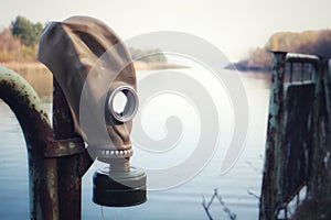 Soviet gas mask on Pripyat river, Chernobyl exclusion zone