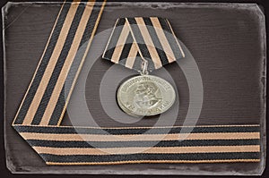 Soviet military medal and George ribbon, antique toned