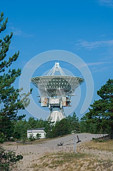 Soviet radio telescope near abandoned military town Irbene