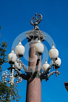 Soviet symbol over a street lamp, a star and hammer crossed with a sickle