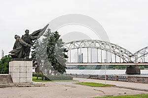 Soviet Victory Monument, Riga, Latvia with a train bridge in the background