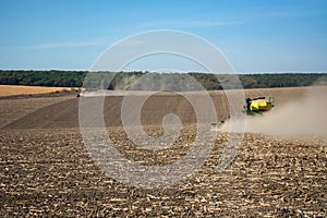 Sowing grain with a modern machine in the field