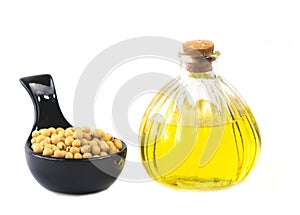 Soy beans and oil isolated on white