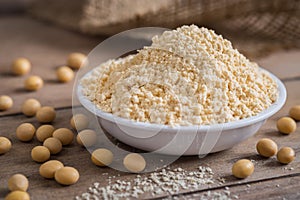 Soy flour in bowl and soybean