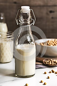 Soy milk in mason jar and bottles