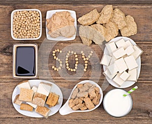 Soy products on wooden background