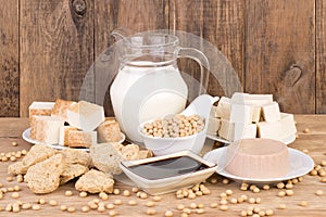 Soy products on wooden background