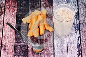 Soybean milk filling jelly ,cereal and grain served with deep-fried dough stick as Patongko