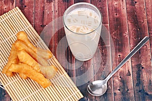 Soybean milk filling jelly ,cereal and grain served with deep-fried dough stick as Patongko