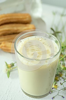 Soybean milk with fried bread stick on the white background