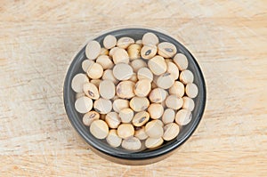 Soybeans in black ceramic bowl photo