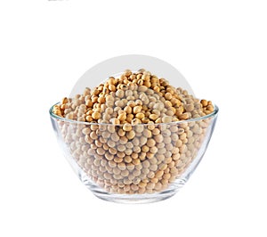 soybeans in a clear glass bowl isolated on white background