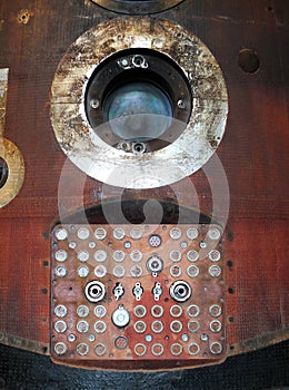 Soyuz capsule window and connecting panel with reentry burns photo