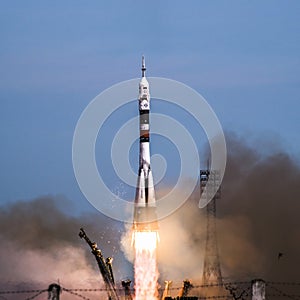 Soyuz rocket launch in Baikonur cosmodrome carrying crew to ISS