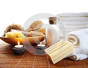 Spa accessories with candles and towels