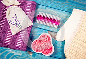 SPA accessories for hygenic and bath in a composition on a blue background.