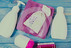 SPA accessories for hygenic and bath in a composition on a blue background.