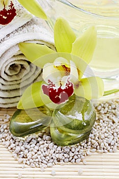 Spa accessories: zen stones, towel, sea salt