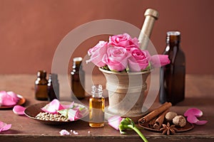 Spa aromatherapy set with rose flowers mortar spices