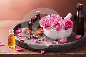 Spa aromatherapy set with rose flowers mortar and spices