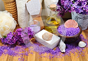 SPA - Aromatic sea salt and scented soap, scented candles and massage oil and accessories for massage and bath