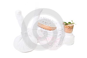 Spa arrangement with bath salt and rose oil isolated on white