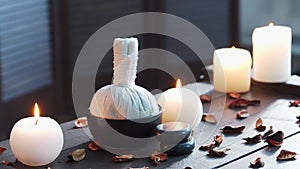 Spa background. Candles, massaging stones and herbal balls. Massage, oriental therapy, wellbeing and meditation.