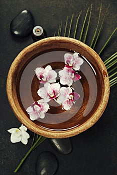 Spa background with floating flowers