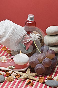 Spa background and red grapes.