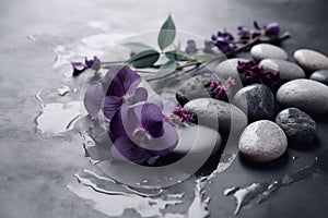 spa background with smooth spa stones and purple flowers