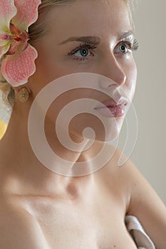 In Spa: Beautiful young sensual woman & flower